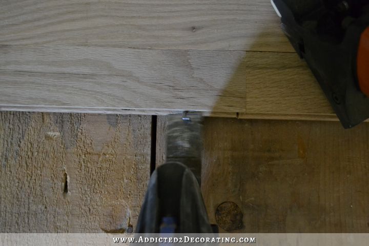 hardwood flooring installation - cut off misfired cleats with an oscillating saw