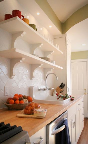 kitchen with white herringbone subway tile backsplash by Four Brothers LLC, via Houzz
