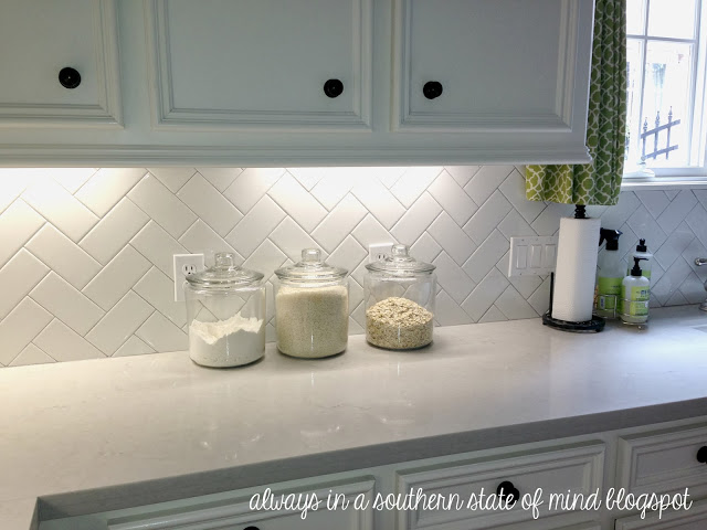 kitchen with white herringbone subway tile backsplash, from Always In A Southern State Of Mind blog
