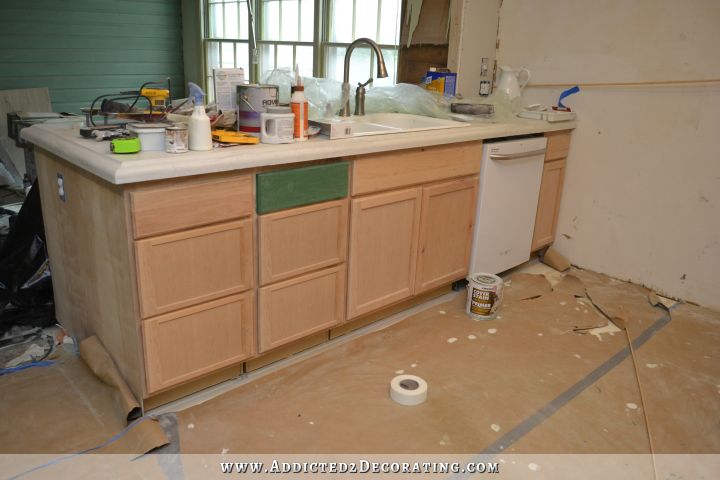 adding gold leaf to kitchen cabinets - 1