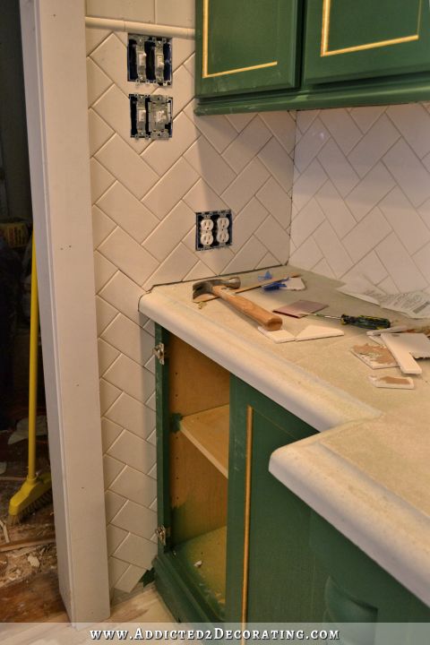 tiled kitchen walls - herringbone subway tile