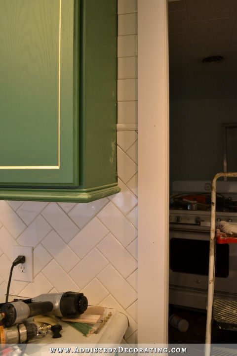 tiled walls in kitchen - herringbone subway tile