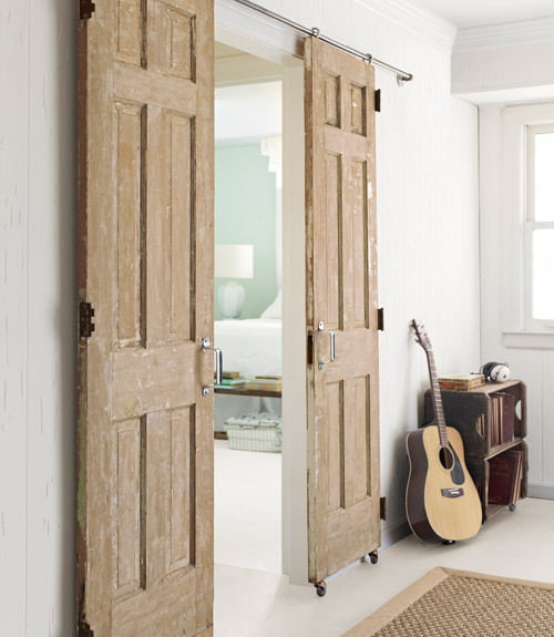DIY sliding rolling barn door style doors from Crisp Interiors via Country Living
