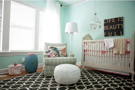 a little bit of black - baby girl room with black patterned rug and black artwork by Jessica McIntyre Interiors, via Houzz