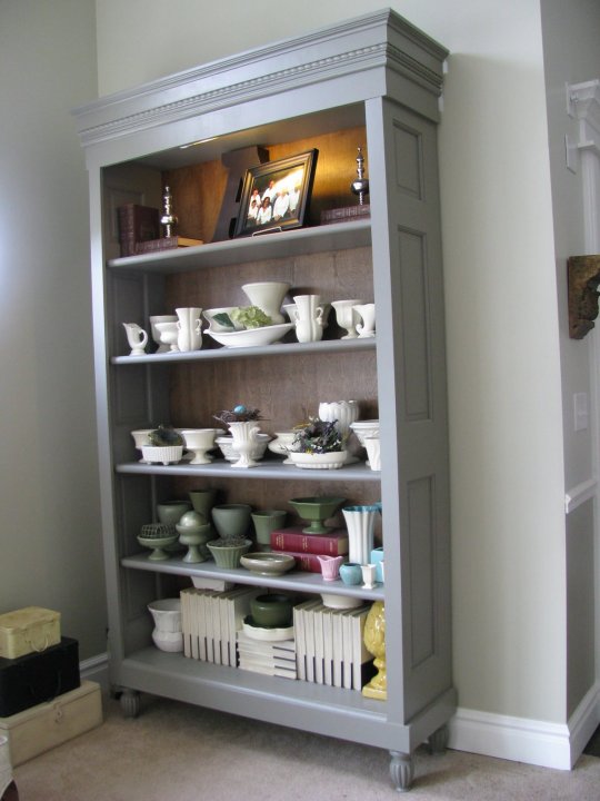 Repurposed doors project - build a bookcase out of an old vintage door, via Joys Of Home