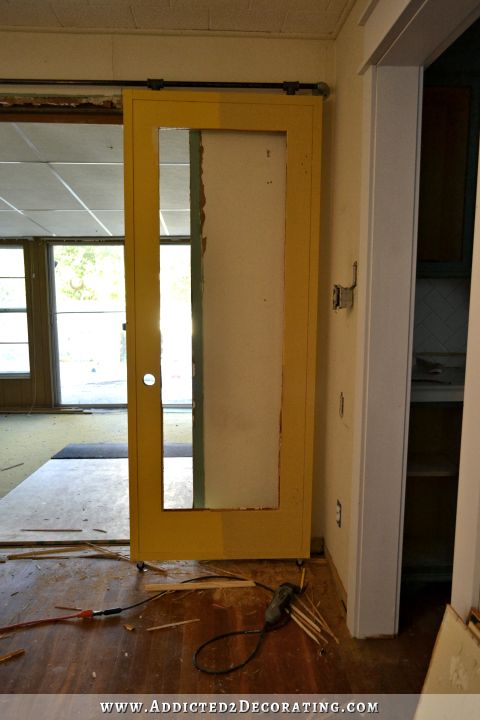 repurposed old door into french door