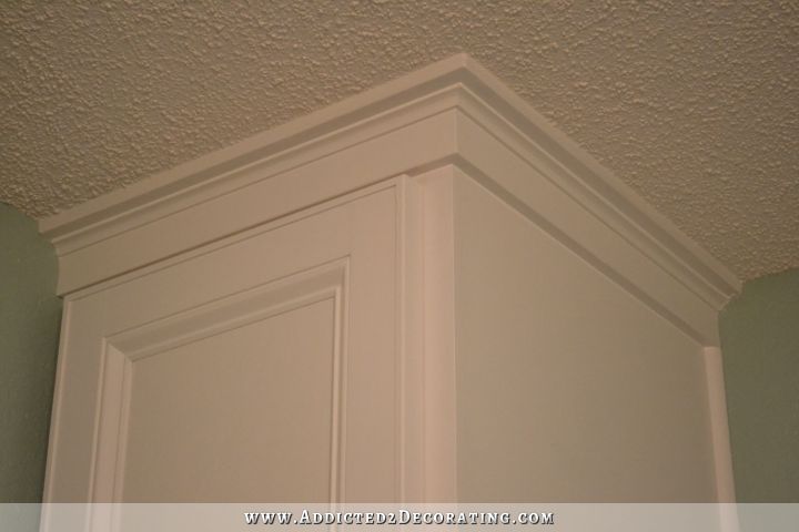 An easy DIY alternative to crown moulding - caulked, painted, and finished