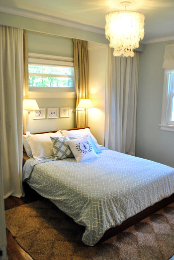 closets flanking bed - bedroom from Young House Love