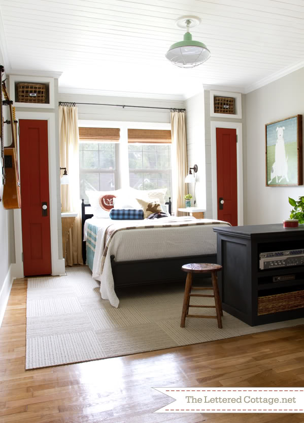 closets flanking bed - guest bedroom by The Lettered Cottage