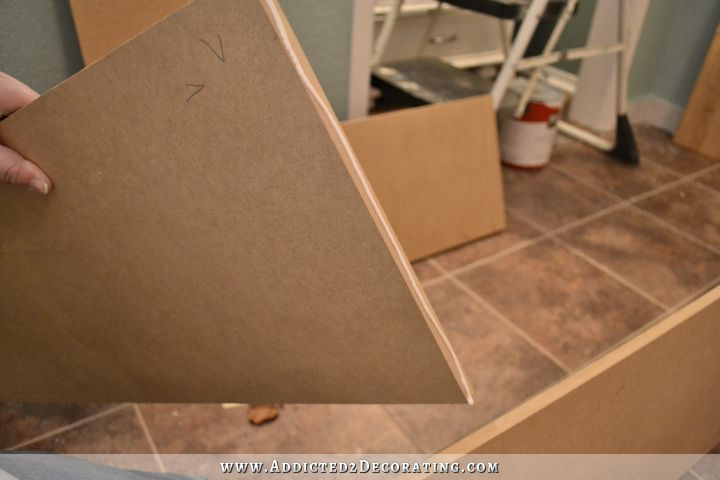 How to build a bookshelf - cut pieces of MDF or plywood for the shelves, and then attach to the sides