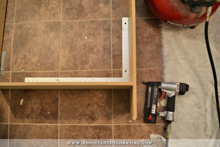 DIY bookshelf - use wood glue and nails to attach shelf to sides