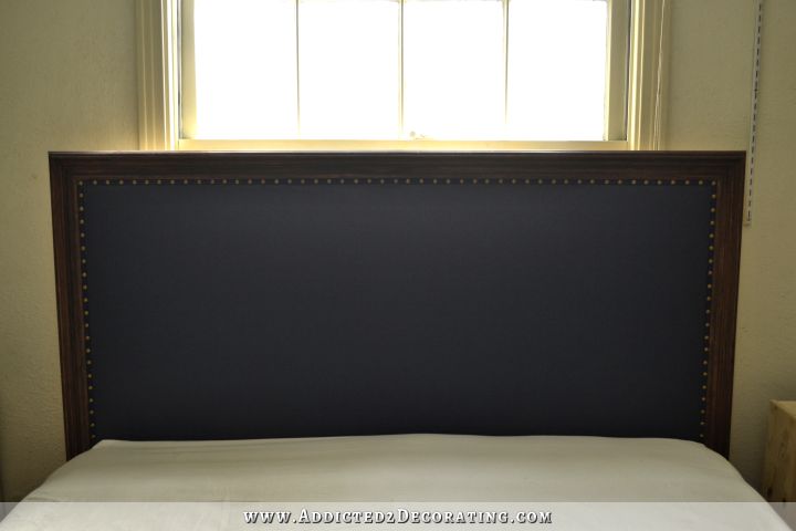 DIY wood framed upholstered headboard - navy blue vinyl with stained frame - 20