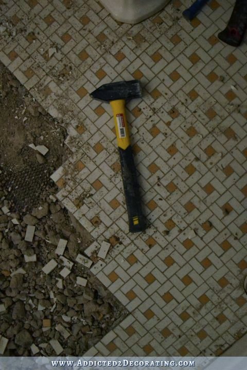 hallway bathroom - tiled floor demolition 4