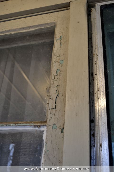 old wood windows - layers of old paint probably including lead-based paint