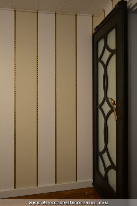 striped walls with nailhead trim accents - 12