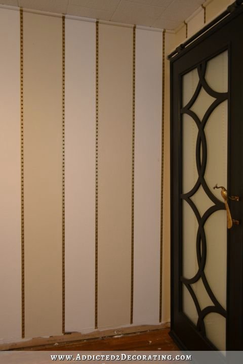 striped walls with nailhead trim accents - 8