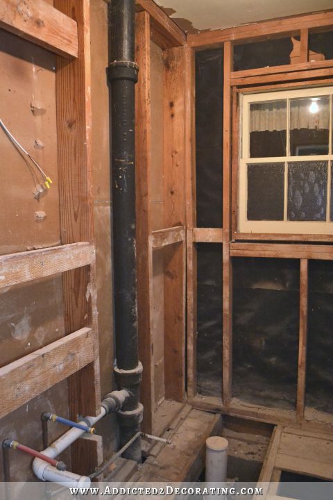 bathroom remodel - 1940s tile, thick mortar bed, and wire removed from walls and floor