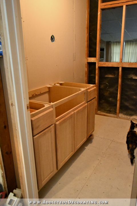 Original 1930s walls uncovered in kitchen-- bead board and 24 studs!