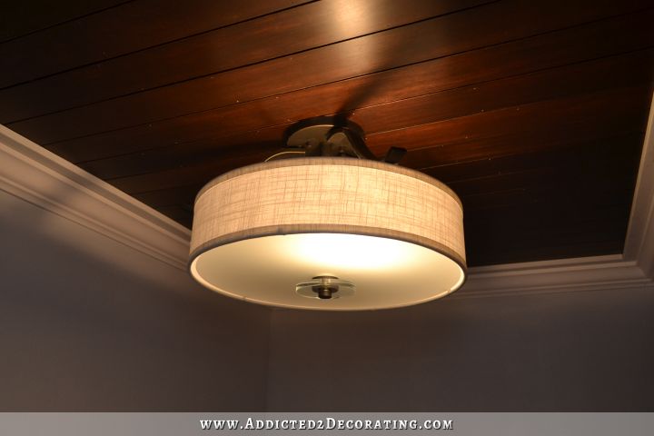 stained wood slat ceiling in hallway bathroom - 5