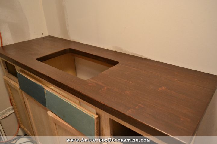 DIY butcherblock countertop made of pine and stained with dark wood stain