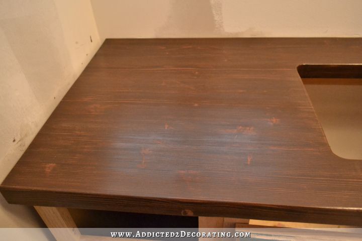 DIY butcherblock style countertop - sanded and stained with slight wood grain and knots showing through