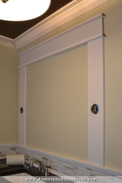 Framed bathroo mirror with integrated sconces - 5