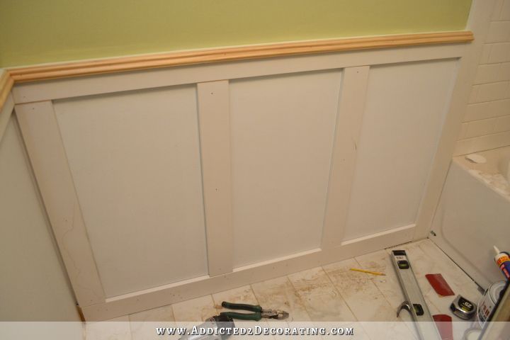 bathroom walls - recessed panel wainscoting with tile accent - 1