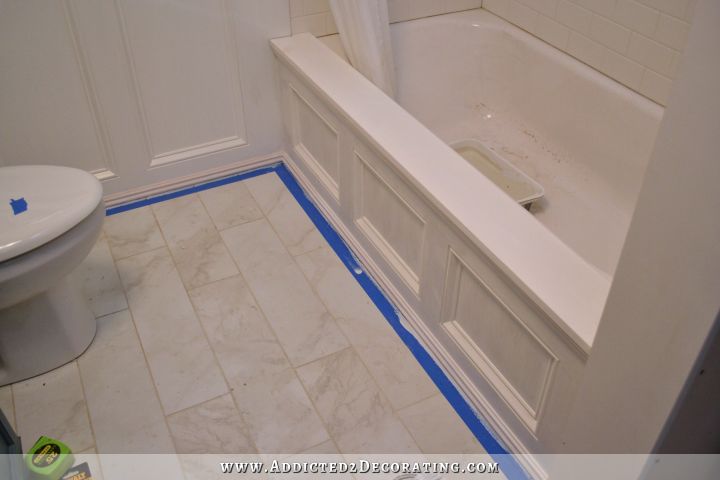 DIY bathtub skirt - step  8 - fill joints with wood filler, caulk cracks and crevices, prime with an oil based primer