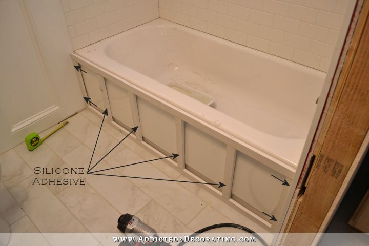 how to build a tub skirt - step 2 - attach frame to the tub with silicone adhesive