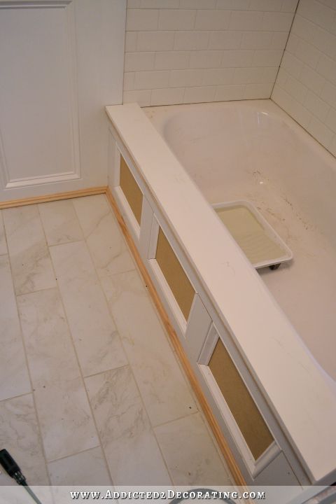 DIY bathtub skirt - step 7 - add a ledge to the top using silicone adhesive