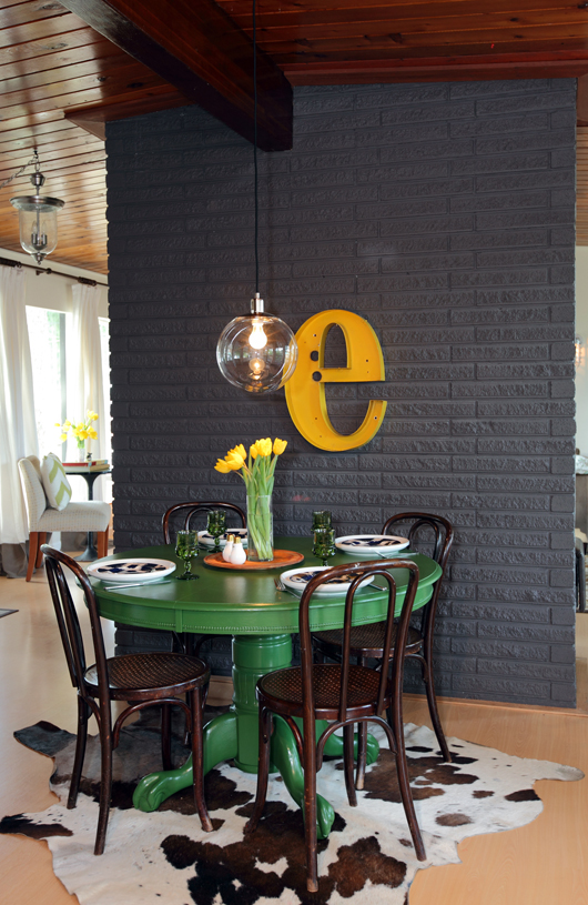 colorful painted dining table - green dining table via HGTV.ca