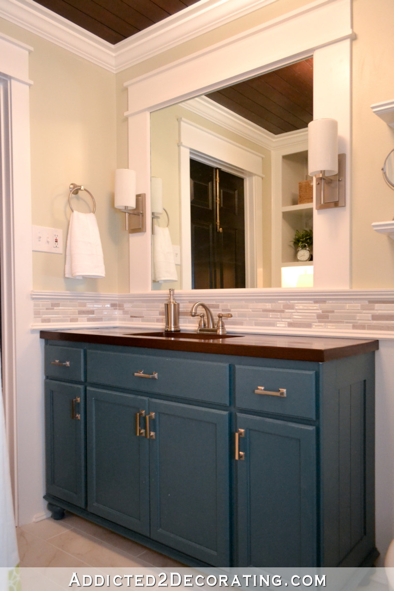 DIY bathroom vanity made from inexpensive stock oak cabinets from a big box home improvement store