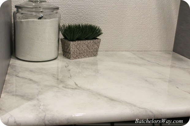low cost bathroom updates - faux marble countertop from Batchelors Way blog