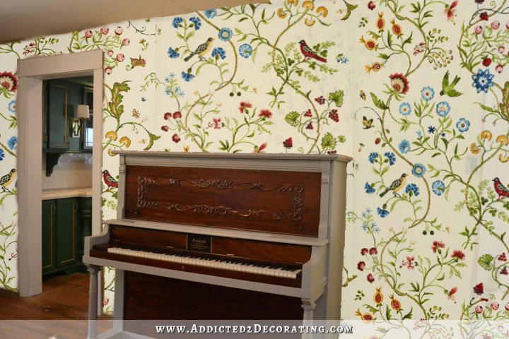 birds and limbs wallpaper in music room