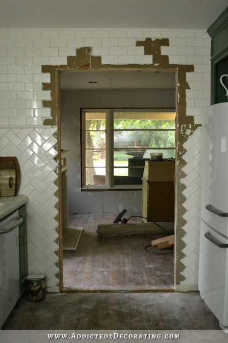 new cased opening in load bearing wall from dining room to kitchen - 11