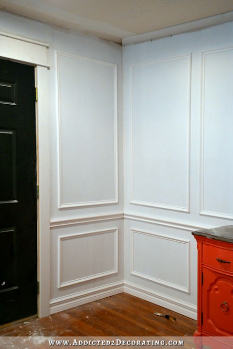 Full wall picture frame moulding in progress - How to install picture frame moulding wainscoting - addicted2decorating.com