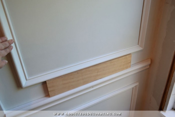 How to install upper panels - How to install picture frame moulding wainscoting - addicted2decorating.com