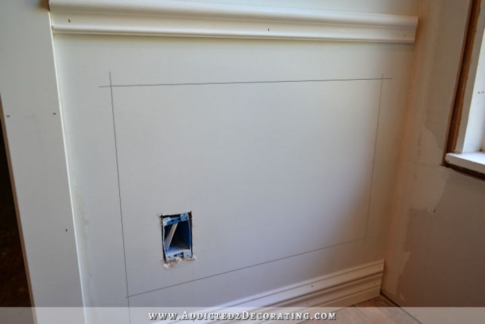 Mark off rectangle with a pencil - How to install picture frame moulding wainscoting - addicted2decorating.com