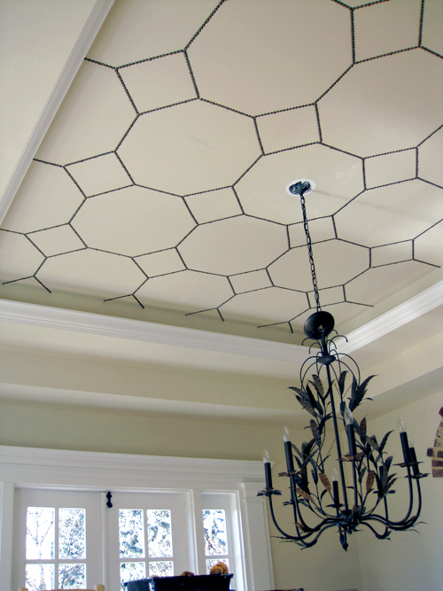 ceiling decorating ideas - nail head trim ceiling design, via Design Sponge