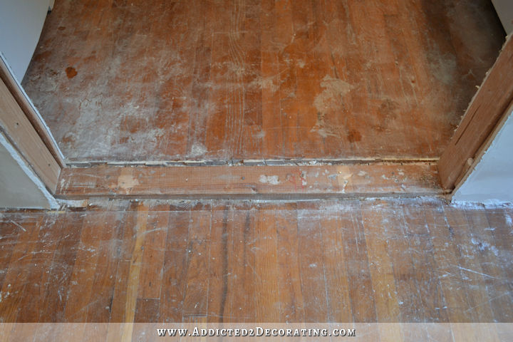 repairing hardwood floor in new doorway - 1