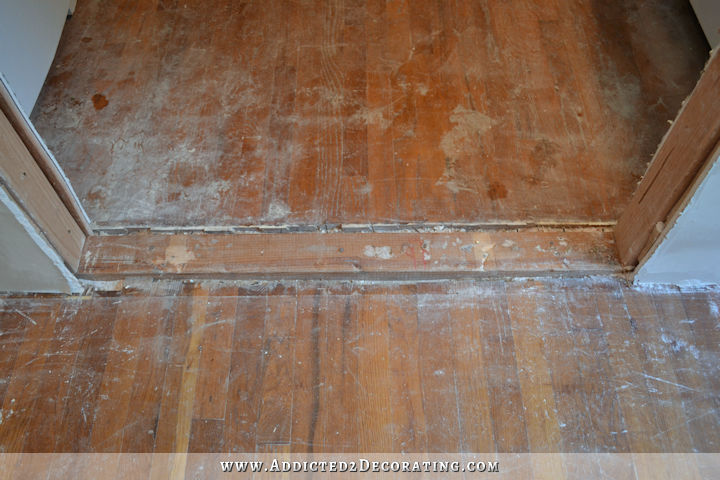 repairing hardwood floor in new doorway - 1