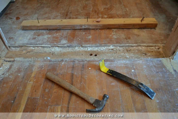 repairing hardwood floor in new doorway - 3