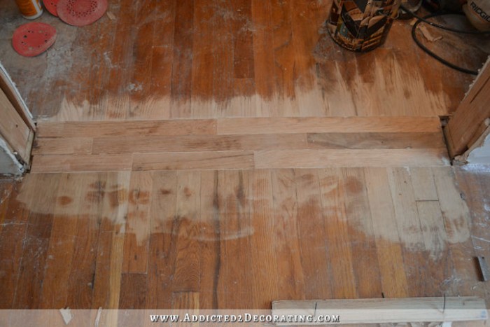 repairing hardwood floor in new doorway - 7