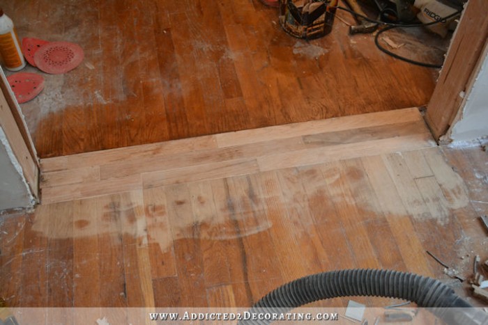 repairing hardwood floor in new doorway - 8