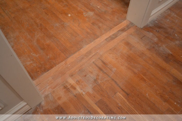 repairing hardwood floor in new doorway - 9