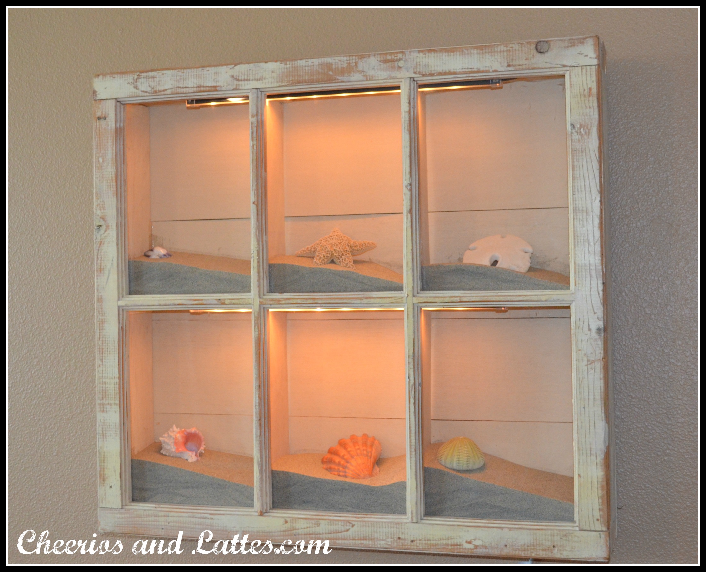 ways to repurpose old windows - create a shadowbox out of an old window, via Cheerios and Lattes blog