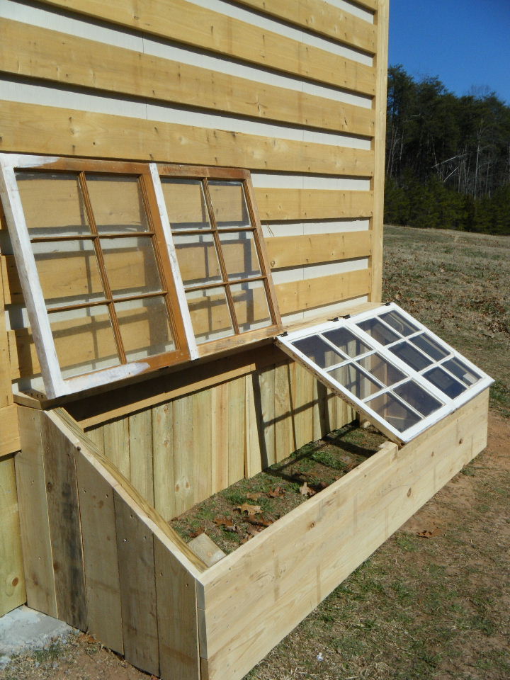 ways to repurpose old windows make a small greenhouse box with windows as lids via Simply Country LIfe blog