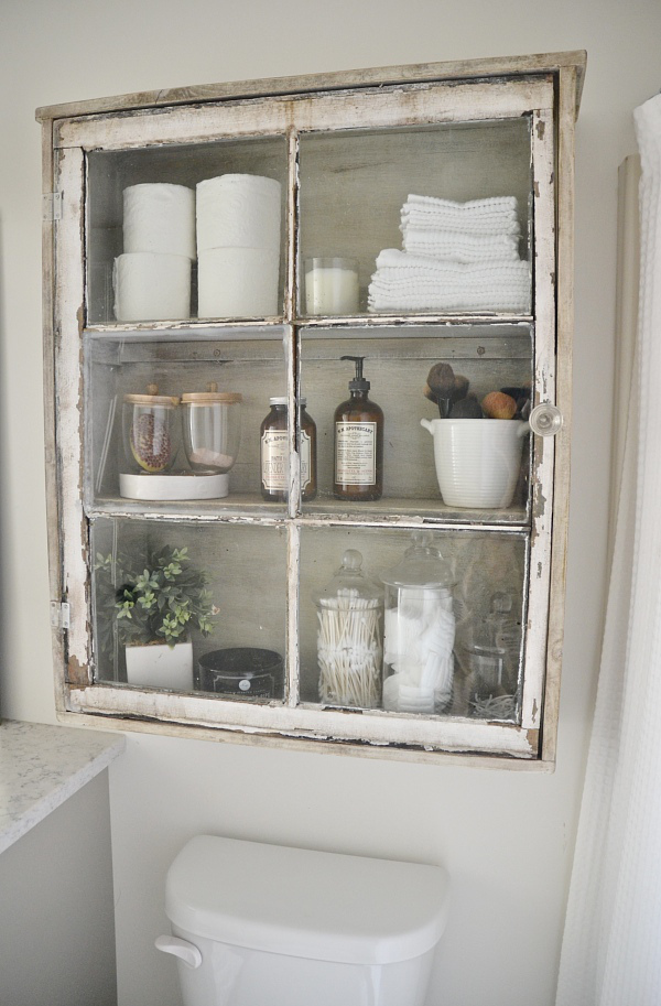ways to repurpose old windows - turn a window into a wall cabinet for the bathroom, via Liz Marie Blog