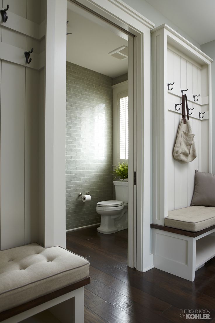 hallway - built in hall tree painted white with stained seat and upholstered cushion