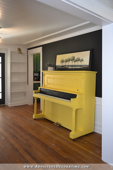 black and white music room with yellow piano - 1